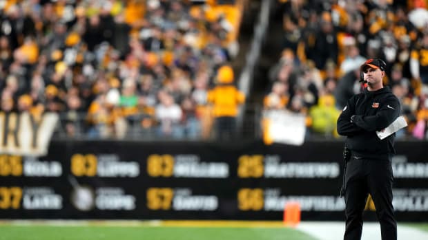 Cincinnati Bengals head coach Zac Taylor looks at the scoreboard in the fourth quarter during a Week 16 NFL football game between the Cincinnati Bengals and the Pittsburgh Steelersl, Saturday, Dec. 23, 2023, at Acrisure Stadium in Pittsburgh, Pa.